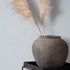 Buz mavisi tonlarında ince mikro dokulu sade podyum esintili lüks duvar kağıdı