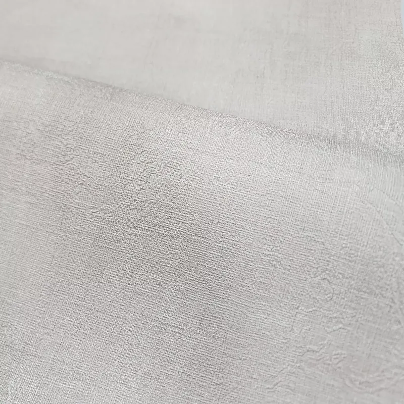 Açık bej tonlarında jüt/keten dokulu, düz modern elyaf duvar kağıdı