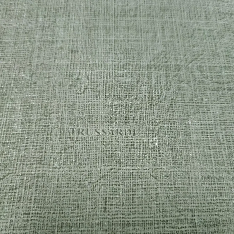 Açık mint yeşili tonlarında keten dokulu, düz modern elyaf duvar kağıdı