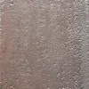 Kahverengi ve toprak tonlarında, sedefli parlamalar içeren, pürüzlü beton dokulu dekoratif duvar tasarımı