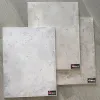 Açık bej ve gri tonlarında, organik ve düzensiz dokulu beton efekti içeren dekoratif duvar tasarımı E130.